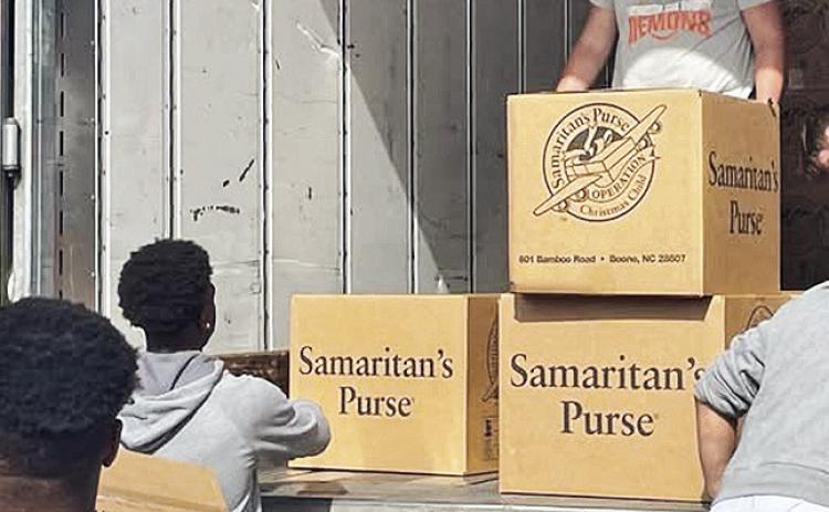 Demons load shoeboxes to travel the world
