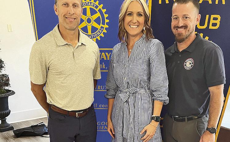 Rotarian with the Program Lance Lopez introduced the principal of Freedom Life Academy, Tori Solomon, and the Athletic Director Steven Solomon at the Oct. 1 luncheon. The school was established three years ago and has 175 enrolled students. From left are Lopez, Tori and Steven.