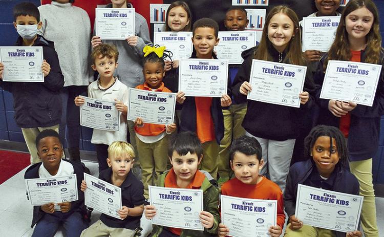 Congratulations to the Kiwanis Club of Natchitoches Terrific Kids for December at Natchitoches Magnet. On front row from left are Kannon Humphrey, Virgil Fansler, Levi Lodrigue, Carson Roque and Kalel Butler. On middle row are Musa Ali, James Newell, Valencia Williams, David Dorsey, Maggie Fluitt and Bentleigh Murphy. On back row are Kiwanis Club Member Meghan B. Sylvia, Vicky Watley, Audrey Hatten, Kylen Moffite and Kennedy Bradley. Not Pictured is Michael Randolph.