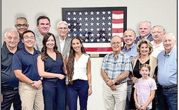 In the front row from left are Board Member Jim Gibson, Drake Hale, Board Member Leeanne Wardlow Foreman, Ragan Hale, Board Member Dr. Greg Brian, Board Member Kay and Thea Foshee, and Johnny Wardlow. In the back row are Board Members Henry Rachal, Ken Hale, James Snyder, Kyler Martinez, Tyler Murchison, and Ronald Roy. Not pictured are Board Members Roger Cunningham, John Brittain, and Dr. Simeon Wall, Jr.