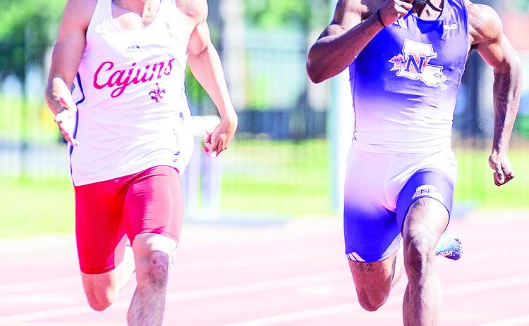Galen Loyd along with his 4x400 relay teammates broke the school record with a 3:10.87 on the final day of the Tyson Invitational. Photo by Chris Reich, NSU Photographic Services