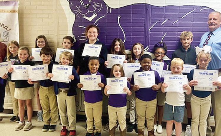 Natchitoches Kiwanis Club presented awards to Provencal Elementary/ Jr. High’s Terrific Kids for March. On front row from left are Mallory Jones, Ryder Sweeney, Randy Collins, Landon Thompson, Macie McManus, Damon Gillie, Jaxon Waxley and Ava Washington. On back row are Principal Diana Curtis, Ryleigh Lacaze, Adrianna Bennett, Collin Lupton, Skylar Bunker, Averie Bynog, Aubree Carter, Danielle Forrest, Ryne Williams and Coordinator Dwayne Poe. Not pictured are Evon Robinson and Adrian Key. April