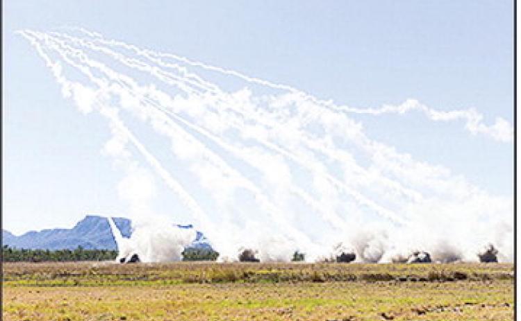 Rockets streak into the air from six M142 High Mobility Artillery Rocket Systems during a combined live-fire portion of Exercise Talisman Sabre 25 in Queensland, Australia, July 14. Photo by Army Master Sgt. Matthew Keeler