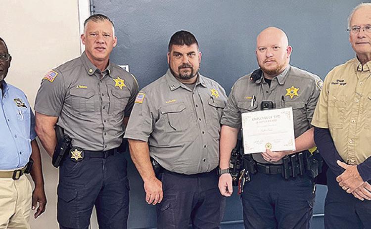 From left are Chief Deputy Winder, Major J. Taitano, Capt. S. LaCaze, Sgt. Collin Crow and Sheriff Stuart Wright.