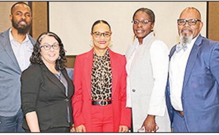 Guests who served on a panel to discuss the legacy of the late U.S. Supreme Court Justice Thurgood Marshall were, from left, Judge David Williams, Dr. Rebecca Riall, Judge Monique Rauls, Dr. Carmella Parker and Dr. Michael McClanahan.