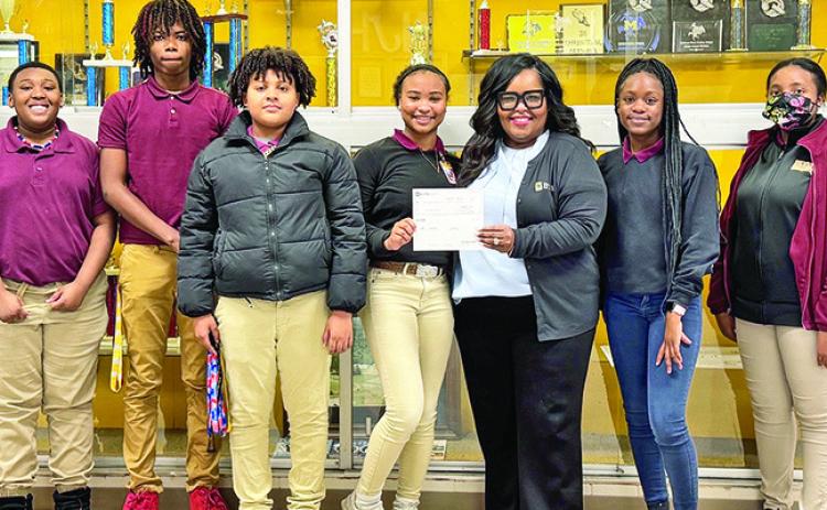 From left are Scottlyn Johnson, TaJarrius Bowers, Marcus Conday, Genesis Conday, Katrice Below, MyCayah Roberson and Jazmine Moore.