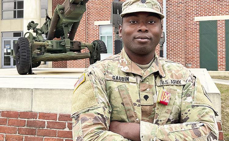 Spc. Gregory Gaudin, a cannon crew member with the 1-141st Field Artillery Battalion, poses for a photo shoot highlighting African American Soldiers in observance of Black History at Jackson Barracks in New Orleans, Louisiana on January 23, 2024