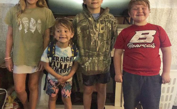 Sandi and James Strickland visited their great-grandchildren last Saturday. From left are Kensley, Kohen, Kason and Koltyn.