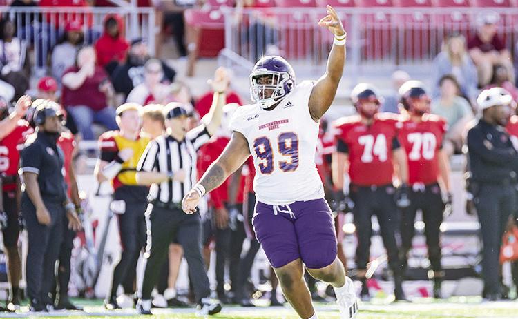 Donovan Green celebrates making a tackle against Lamar in October. Photo by Chris Reich/NSU Photographic Services