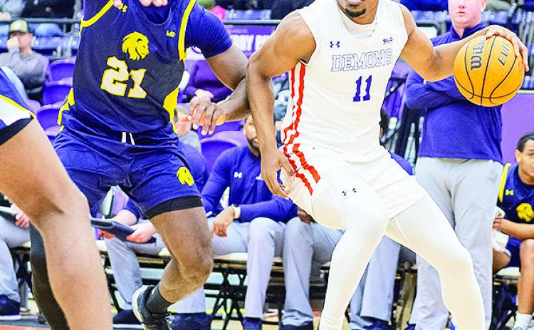 Northwestern State’s Chris Mubiru (right) will play for the Ugandan national team in August’s FIBA Afrobasket Tournament. Photo by Chris Reich/NSU Photographic Services