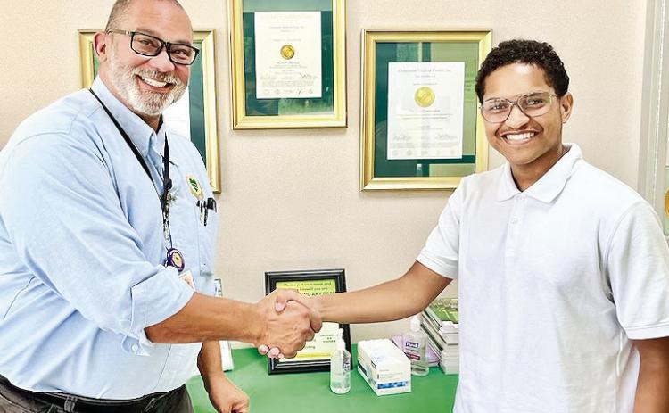 Student pursuing medical career is newest ‘helping hand’ at OMC