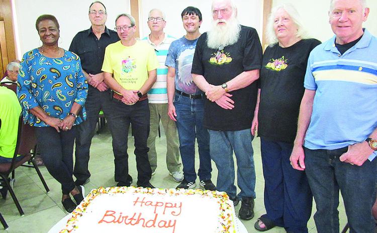 The monthly Young at Heart luncheon for seniors was held on Oct. 4 at First United Methodist Church. Celebrating October birthdays were, from left, Wanda Holden, Hugh Gentry, James Ray Dowden, Cyril Moreland, Nyle Parchim, Jr., Chuck McQueen, Dorothy Kissell, and Perry Sprowl. The Bostick-Bradley Circle provided fall decorations.