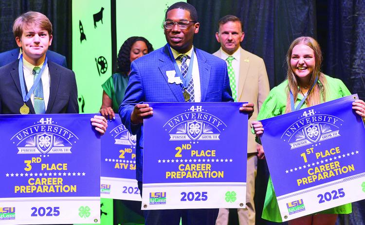 Kinzie Brassell, right, of Jefferson Davis Parish, received first place in the career preparation contest at 4-H University. Alex Theall, left, of Lafayette Parish, finished third, and Joe Lewis, of Winn Parish, won second place. 4-H members from across the state competed for cash prizes, scholarships and educational trips during the event held on the LSU main campus. Photo by Olivia McClure/LSU AgCenter