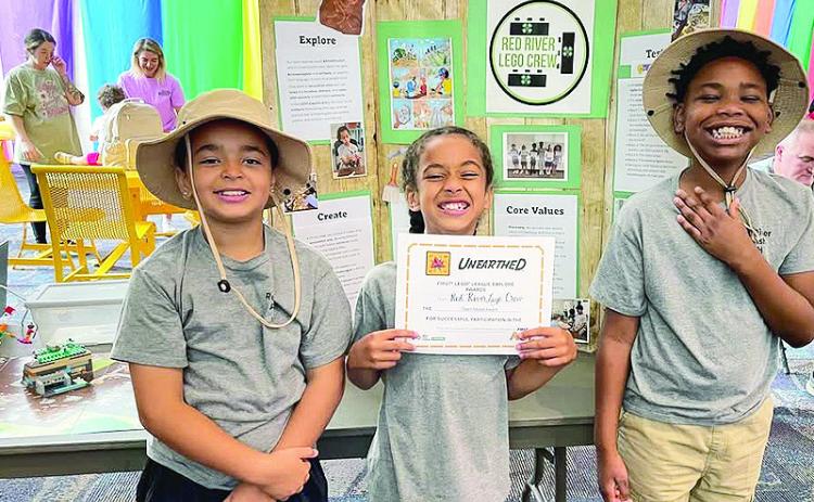 Arayah Mitchell, Jamari Thomas, and Zaden Williams, 4-H Cloverbuds from Red River Elementary, participated in the FIRST LEGO LEAGUE Robotics Festival at Artbreak in Shreveport. They did a great job and were awarded best model!