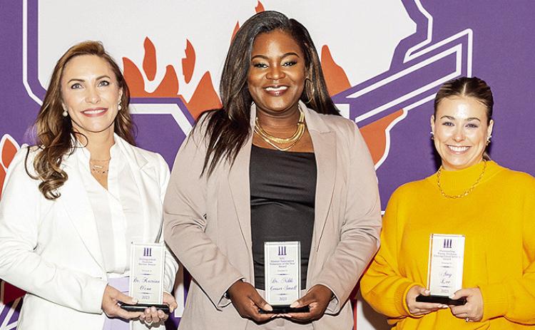 Outstanding alumni were honored during Northwestern State University’s Long Purple Line program Nov. 3. From left are Dr. Katrina O’Con, Outstanding Alumna Distinguished Service Award winner; Dr. Nikki Ceasar-Small, the NSU Alumni Association’s Volunteer of the Year Award winner, and Amy Lee, Outstanding Young Alumna Award.