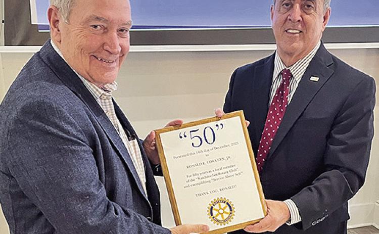 Rotary Club Louie Bernard, right, presented a 50 Tear Membership Certificate to long-time Natchitoches Rotary Club member Ronald Corkern. Cornernis an attorney who has served the club with distinction for 50 years.