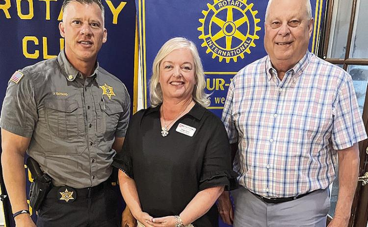 Rotarian with the Program Tommy Caldwell introduced the executive director of the Natchitoches Parish Tourist Commission Paige Alost at the July 23 Rotary luncheon. Alost gave an update of her goals and objectives. From left are President Jesse Taitano, Alost and Caldwell.