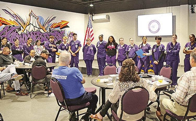 NSU nursing students in their first level of clinicals at the Natchitoches campus and their professor Dr. Shaun Wheat, far right, spoke to the Natchitoches Kiwanis Club about putting classroom knowledge into nursing practice.