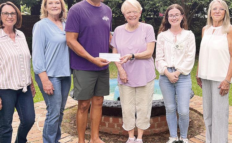 The Krewe of Dionysos has selected the Association for the Preservation of Historic Natchitoches (APHN) as the recipient of one of its annual charitable donations. From left are Carolyn Benefield, Krewe of Dionysos Treasurer; Jodi Shirley, Queen Dionysos XXVIII; Leonard Sarpy, Captain Dionysos XXIX; Chris Evans, chair of the Third Grade Children’s Tour; Abigail Boykin, executive director; and Arleen Mayeux, APHN president.
