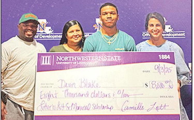 Devin Blake was named a recipient of the Luther W. Lott Sr. Memorial Scholarship presented to a dependent of a Lott Oil employee. From left are Rico, Benita and Devin Blake with Camille Lott, Lott Oil director of Marketing.