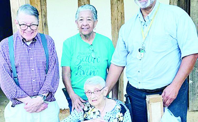 Dr. Pete Gregory, Gloria Jones (seated) join St Augustine Historical Society members, Vera Severin and Mark Guidry to inspect the progress.