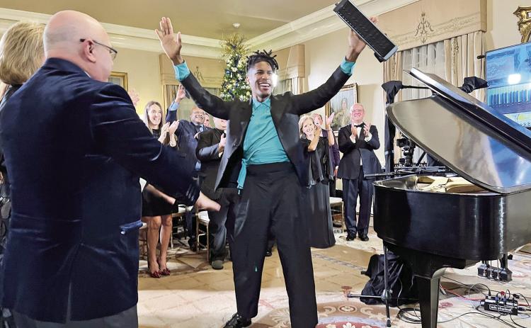 Louisiana native Jon Batiste entertain guests of Gov. and Mrs. Jon Bell Edwards.