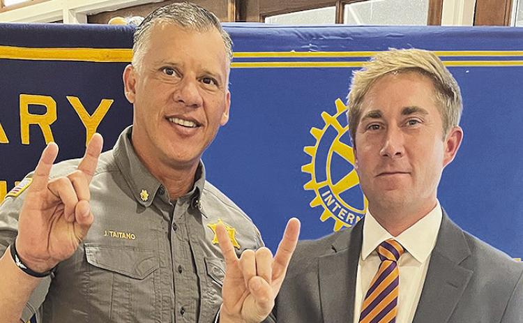 Northwestern State University Executive Vice-President and Chief of Staff Drake Owens updated the Rotarians on the most recent academic and athletic activities at NSU. From left are President Jesse Taitano and Owens.