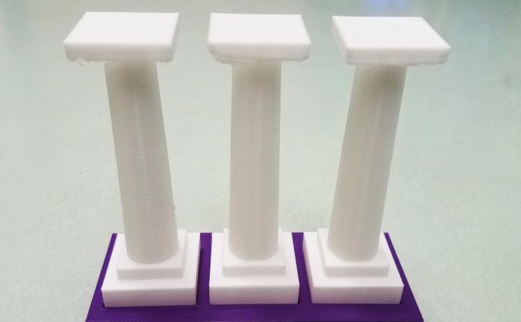 Pictured is a 3D printed model of the NSU columns made by combining several cubes and a cylinder together.