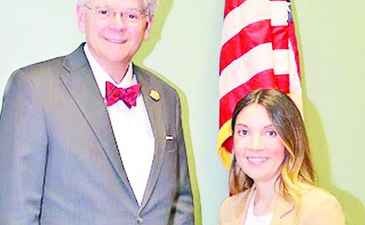 Katie Jo Miller, Esq., is the first military spouse attorney to take advantage of the opportunity to practice law in Louisiana. Louisiana Supreme Court Justice Jay B. McCallum administered the oath of office to Miller.