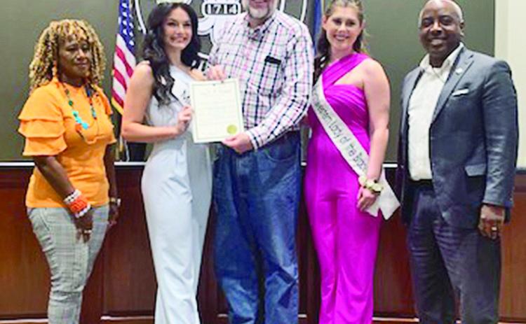 At the City Council meeting last week, the Council declared July 20 Natchitoches-Northwestern Folk Festival Day. From left are Councilperson- at-Large Betty Sawyer Smith, Miss Cane River Jessee Foshee, Folk Festival Director Dr. Shane Rasmussen, Miss Lady of the Bracelet Madison Sims and Mayor Ronnie Williams Jr. See Page 6-7A for Folk Festival and schedule.