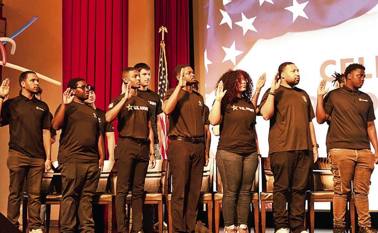Sixteen future soldiers take the Oath of Enlistment at the National WWII Museum in partnership with the Louisiana Dept. of Education (LDOE) commemorating ‘Constitution Day’ August 2024. Photo by US Army
