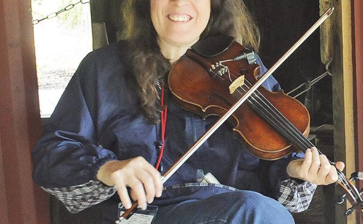 Fiddler Gina Forsyth, who will be taking part in “Fiddlin’ with the Finest! A Celebration of Louisiana Folk Fiddling” Saturday, June 13 at 2 p.m. at the LSU Rural Life Museum at 4560 Essen Lane in Baton Rouge. Photo by Terri Fensel