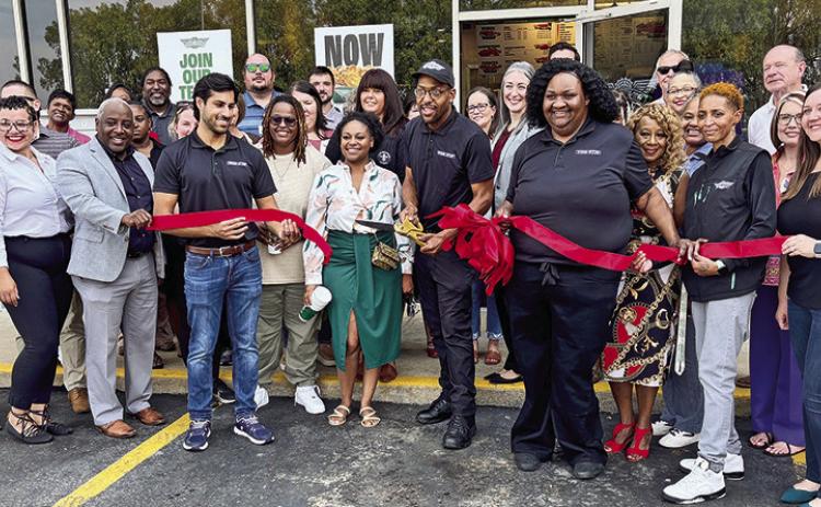 The Natchitoches Area Chamber of Commerce hosted a ribbon cutting ceremony Sept. 15 to welcome the City’s newest eatery Wingstop located at 929 Keyser Ave. suite F. Among the numerous attendees were Mayor Ronnie Williams, Jr., Councilwoman at Large Betty Sawyer Smith, Police Chief Nikeo Collins and John Barr from Sen. John Kennedy’s Office.