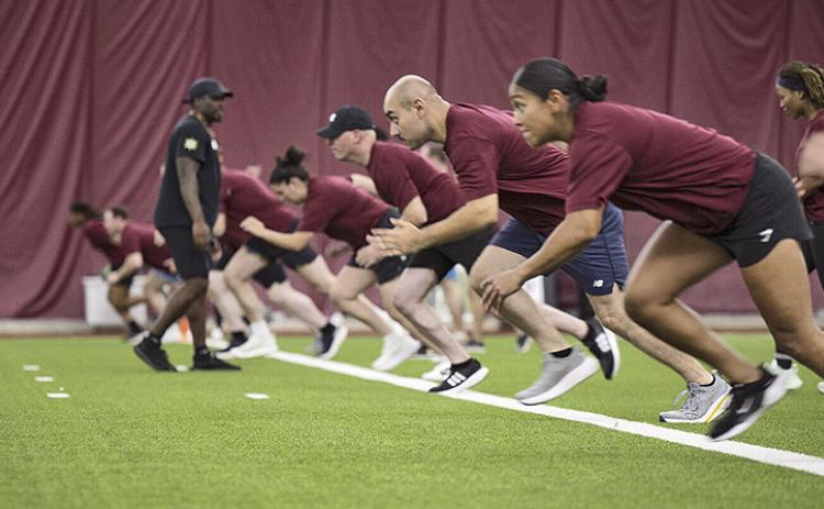 Service members participate in the Salute to Service NFL Boot Camp hosted by the Washington Commanders at OrthoVirginia Training Center, Ashburn, Va., Aug. 10, 2025. Photos by Navy Petty Officer 2nd Class Aiko Bongolan