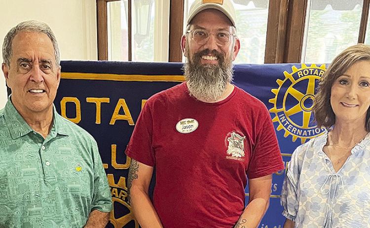 Rotarian with the Program Rhonda Jones introduced the owner and creator of Dark Woods Adventure Park Jason Summerlin at the May 13 Rotary luncheon at Merci Beaucoup. Summerlin shared his past, present and future visions of the park for family fun. From left are Rotary President-elect Louie Bernard, Summerlin and Jones.