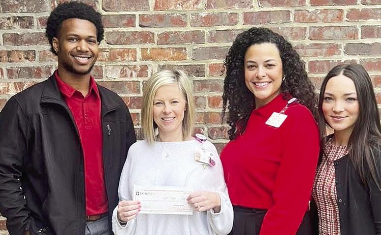 BOM is continuing its support of the Natchitoches Regional Medical Center’s Partners in Excellence program.The sponsorship check supports the Steel Magnolia Run, NRMC Gala on May 17, TappedTober on Oct. 18 and the Halloween Golf Classic on Oct. 31. From left are BOM’s Jorian Dodd, Halie Errington, Blaise LaCour, and BOM’s Hannah Macato.