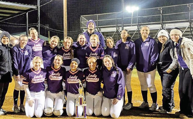 Lady Demons finished in first place in A bracket of the Montgomery Jr. High Softball Tournament last Friday. They were undefeated, scoring 17 runs and allowing 8. This is their fourth year in a row bringing home a trophy from this tournament.