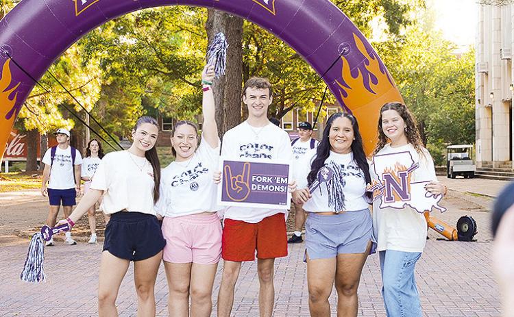 From left, NSU students Hannah Kennedy, Vivian Montalvo, Thomas Perryman, Atziary Perez and Madelyn Murphy pose for a first-day photo on the Kyser Brickway Aug. 17.