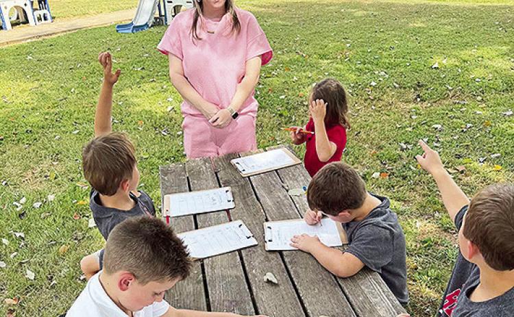 Mrs. Chrissy’s first graders took their classroom outside last week to explore nature using their five senses. There’s no better way to learn about the world around us than to get outside, observe, explore, and experience it firsthand.