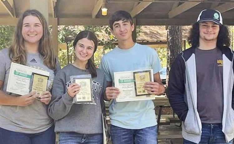 Natchitoches Central’s 4H forestry team won first place in the state Forestry competition. From left are Dinah Elzey, Madeline Mitchell, Blaine Mitchell and Lucas Broadway.