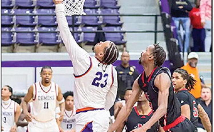 In a defensive battle defined by missed opportunities and late drama, Northwestern State came up just short Saturday night, falling 52-48 to East Texas A&amp;M at the Field House. Pictured is Willie Williams , who scored 10 points and snagged 15 rebounds for his fourth double-double of the season. Photo by Chris Reich, NSU Photographic Services