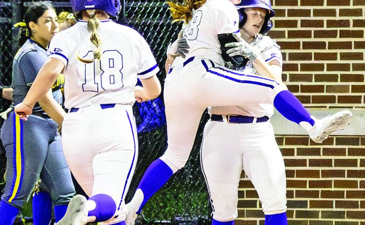 JT Smith celebrates with Sister Arnold following NSU’s 7-6 walk-off win against McNeese. Photo by Zoey Fitts, NSU Photographic Service