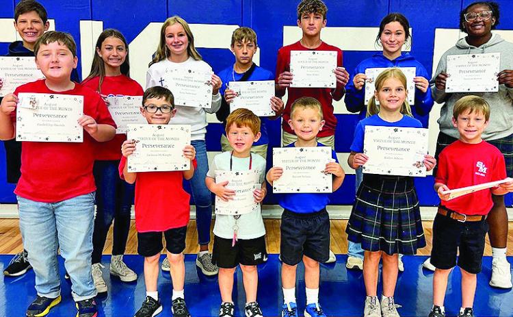 Congratulations to our August Virtue of the Month (Perseverance) recipients. On front ow from left are Cordell Ivy-Daniels, Jackson McKnight, Jace Russell, Barrett Nelson, Kailyn Adkins and Chase French. On back row are Murphy Linebaugh, Aubree Rachal, Anna Todtenbier, Karson Milner, Kane Milner, Mary Hannah Churchman, and Tyonnah Burton. Not Pictured is Brooklyn Townson.