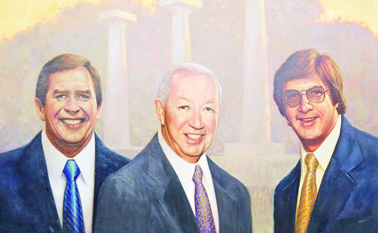 A painting of the late Jack Brittain Jr., Jerry Pierce and Richard Ware was unveiled Nov. 18 during a program to announce three first-generation scholarships established in their memory at Northwestern State University through a donation from Natchitoches attorney Skeeter Salim. Assistant Professor of Art Edgar Cano-Lopez is the artist. The painting symbolizes the lasting legacies of Brittain, Pierce and Ware at the university.
