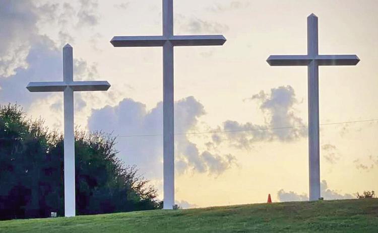 Three crosses mounted on the hill behind First Baptist Church on Second Street symbolize that Jesus was crucified between two thieves but is also symbolic of the love that Jesus has for Christians. Church member Don Gates wanted to give a gift to the church in memory of his late wife, Lenda.