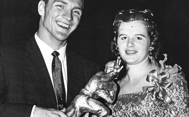 Billy and Dot Cannon pose with the 1959 Heisman Trophy. Photo credit: Associated Press.