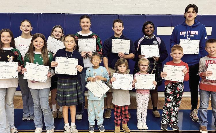 Congratulations St Mary December Virtue of the Month recipients for Joy! In the front row from left are Sutton Vandersteen, Marilyn Mims, Aubrey Williams, Lyanna Esparza, Harleigh Adkins, Amy Poston, Sawyer Gill and Eli Mitchell.On back row are Corbyn Gandy, Jolee Shea, Rayanna Norsworthy, Gannon Sheffield, Ja’keria Guy and Cole Yopp.
