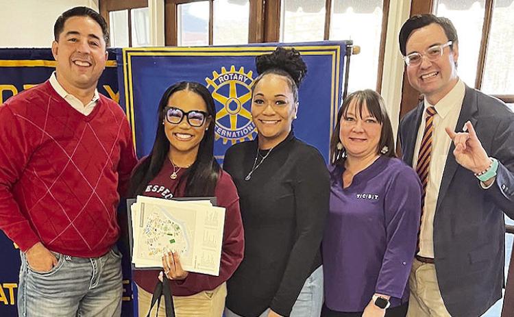 Natchitoches Central High School (NCHS) Senior Gabrielle Essex was introduced by Rotary Coordinator of Student of the Month Jessica Broadway and NCHS Principal Micah Coleman. The Northwestern State University (NSU) Director of Enrollment and Management Van Erikson awarded Essex with an NSU scholarship and she will enroll in the NSU Nursing program in the fall. From left are Coleman, Essex, mother Sabrina Essex, Broadway and Erikson.
