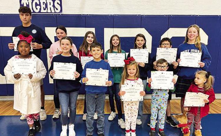 St Mary’s November virtue was gratitude. Students honored in the front row, from left are A’ziah Armstrong, Jolee Shea, Carter Hough, Heidi Byles, Jackson McKnight and Elena Johnson. Back row, from left, are Pol Guivernau-Lozano, Peyton Faucheaux, Madelyn Melder, Raylee Hale, Colie Mathews, Luke Dauzat and Ava Errington. Not pictured are Eva Mayeaux and Grevalia Fisher.
