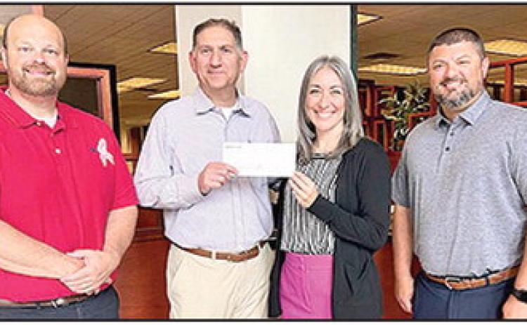City Bank supports the efforts of the Natchitoches Economic Development Alliance (NEDA). NEDA aims to champion investment, maximize potential, and cultivate growth in Natchitoches Parish. Pictured from left are Josh Manuel (NEDA Treasurer and City Bank VP Loan Administrator), John Ackel (City Bank President and CEO), Laura Lyles (NEDA Executive Director), and Brandon McKee (City Bank CFO).